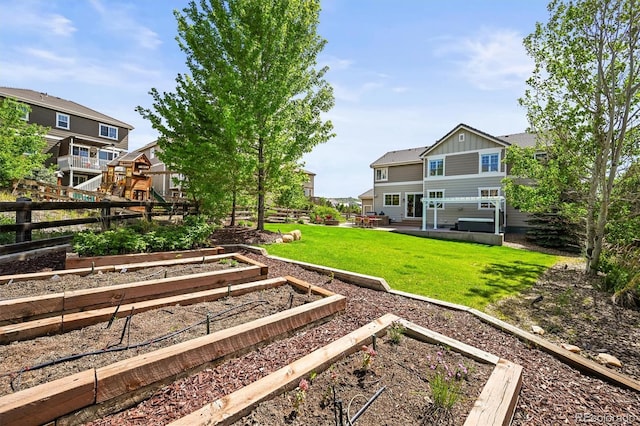 2090 Bellavista St, Castle Rock, CO 80109 - view of yard featuring a vegetable garden and a patio area