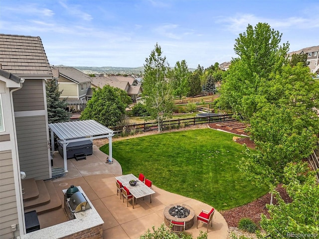 2090 Bellavista St, Castle Rock, CO 80109 - view of yard featuring an outdoor fire pit, a patio, a hot tub, and a residential view
