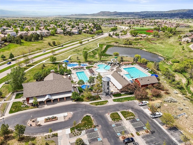 2090 Bellavista St, Castle Rock, CO 80109 - aerial overview of property's location featuring a pool and a water and mountain view