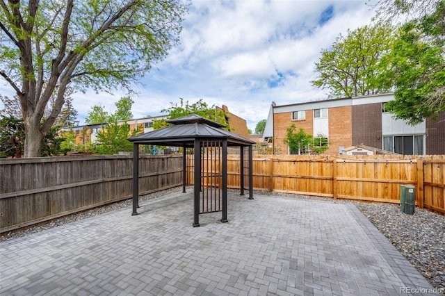 11651 Pennsylvania St, Northglenn, CO 80233 - fenced backyard featuring a gazebo and a patio area