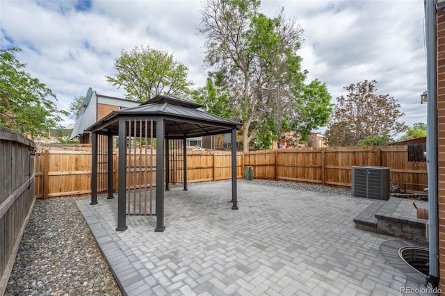 11651 Pennsylvania St, Northglenn, CO 80233 - fenced backyard featuring a patio area, a gazebo, and central AC unit