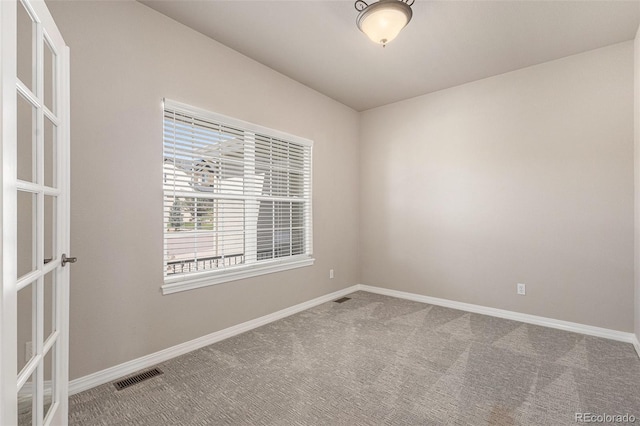 149 Walters Creek Dr, Monument, CO 80132 - carpeted spare room featuring baseboards and french doors