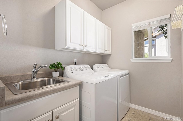 149 Walters Creek Dr, Monument, CO 80132 - laundry area featuring cabinet space, separate washer and dryer, and light tile patterned floors