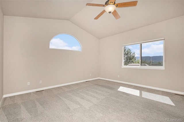 149 Walters Creek Dr, Monument, CO 80132 - carpeted spare room with lofted ceiling and a ceiling fan