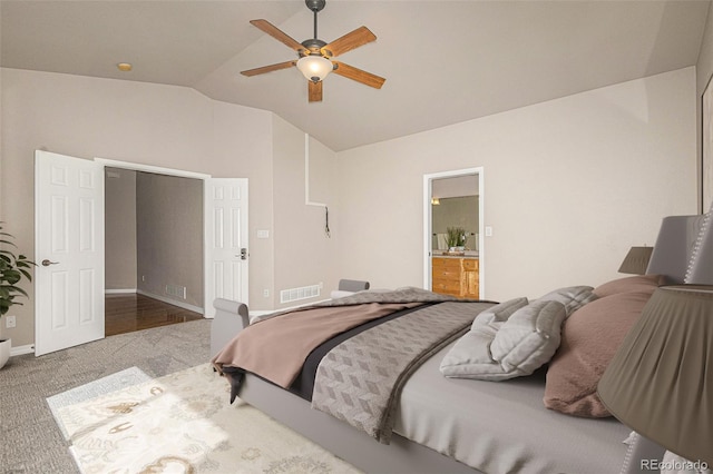 149 Walters Creek Dr, Monument, CO 80132 - carpeted bedroom with lofted ceiling, ensuite bath, and a ceiling fan