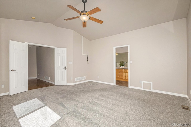 149 Walters Creek Dr, Monument, CO 80132 - unfurnished bedroom with vaulted ceiling, carpet floors, ensuite bathroom, and ceiling fan