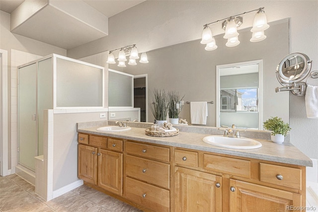 149 Walters Creek Dr, Monument, CO 80132 - bathroom with a shower stall, double vanity, and tile patterned flooring