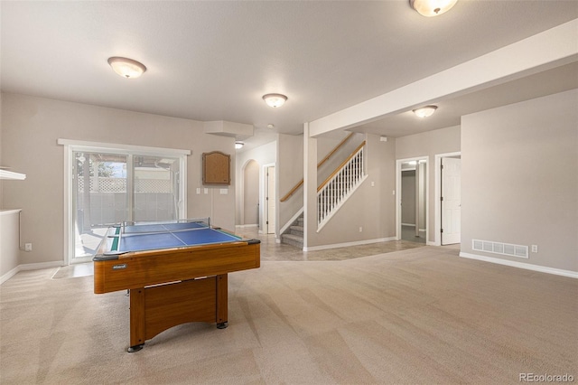 149 Walters Creek Dr, Monument, CO 80132 - rec room featuring light colored carpet, billiards table, and arched walkways