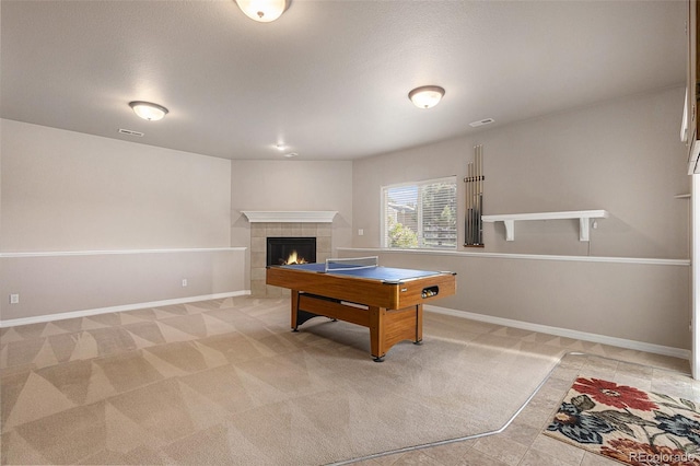 149 Walters Creek Dr, Monument, CO 80132 - recreation room featuring a tile fireplace, light carpet, and billiards