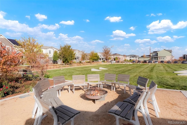 view of patio / terrace featuring a fire pit