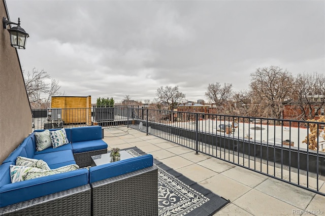 view of patio / terrace featuring a balcony and an outdoor hangout area