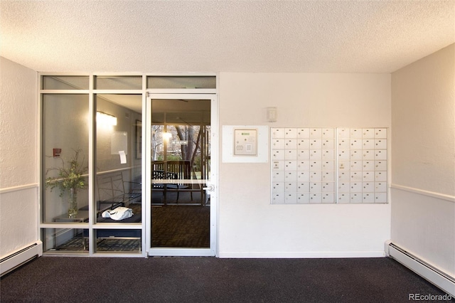 interior space featuring carpet floors, a baseboard radiator, and a mail area