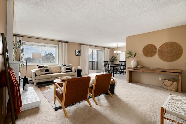 carpeted living room with a textured ceiling and an inviting chandelier