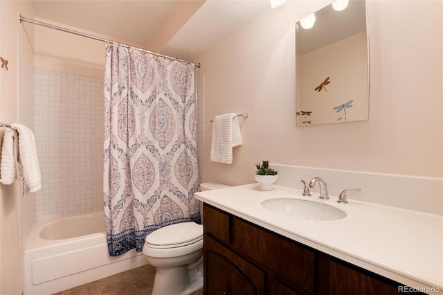 full bathroom featuring tile patterned floors, vanity, shower / bath combination with curtain, and toilet