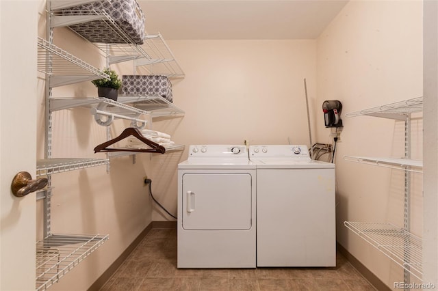 laundry area with washing machine and clothes dryer