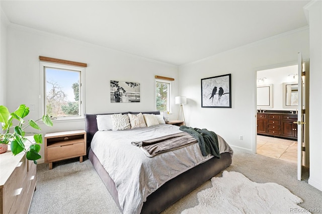 4212 E Orchard Pl, Centennial, CO 80121 - bedroom featuring light colored carpet, crown molding, baseboards, connected bathroom, and light tile patterned floors