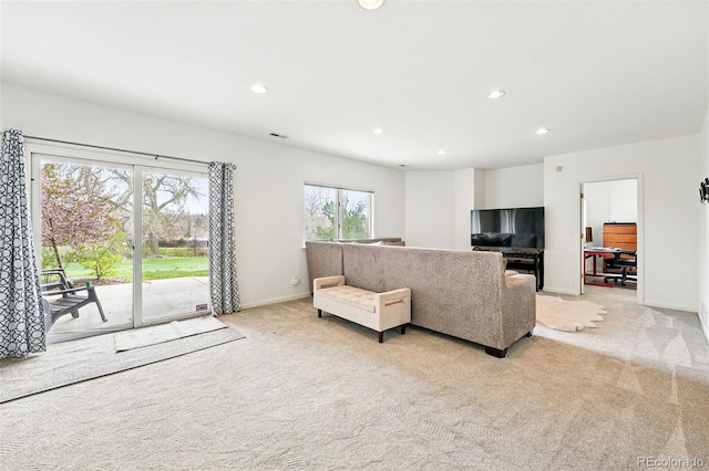 4212 E Orchard Pl, Centennial, CO 80121 - living room featuring light colored carpet, recessed lighting, and baseboards