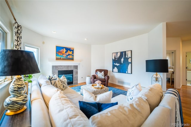 4212 E Orchard Pl, Centennial, CO 80121 - living area featuring a fireplace, wood finished floors, and recessed lighting