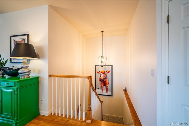 4212 E Orchard Pl, Centennial, CO 80121 - corridor featuring an upstairs landing, wood finished floors, and baseboards