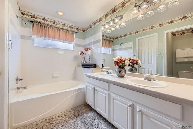 9627 Franklin St, Thornton, CO 80229 - bathroom with plenty of natural light, double vanity, and shower / tub combination