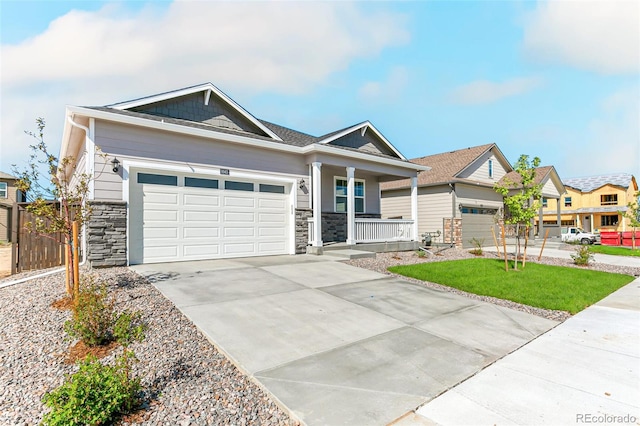 craftsman-style house featuring a garage and a porch