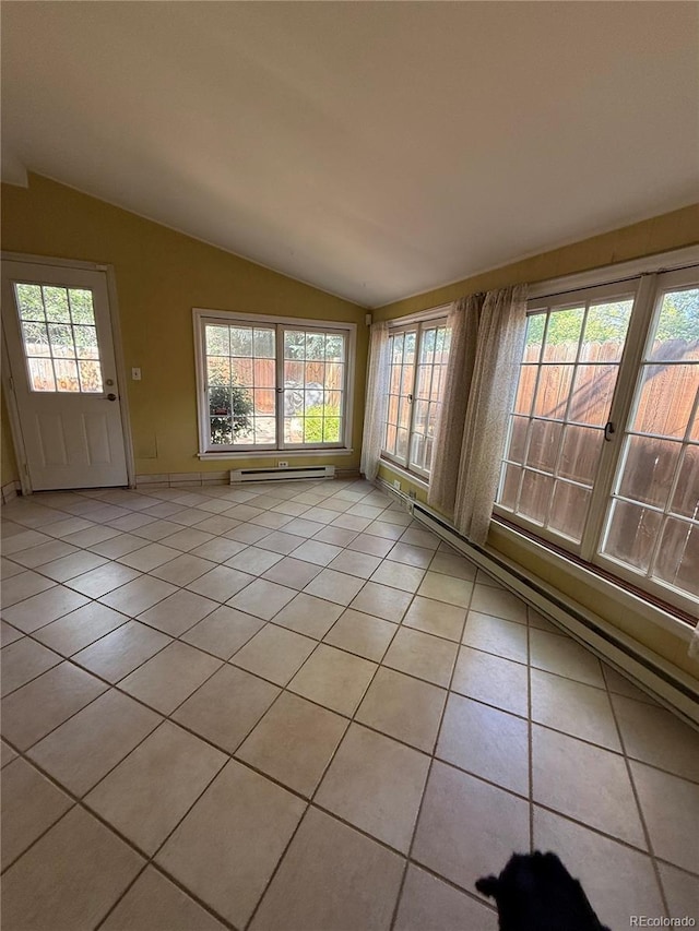 6375 E 6th Avenue Parkway, Denver, CO 80220 - empty room featuring lofted ceiling, baseboard heating, and light tile patterned floors