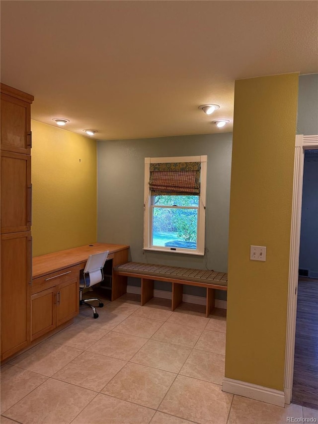 6375 E 6th Avenue Parkway, Denver, CO 80220 - office space featuring built in desk and light tile patterned floors