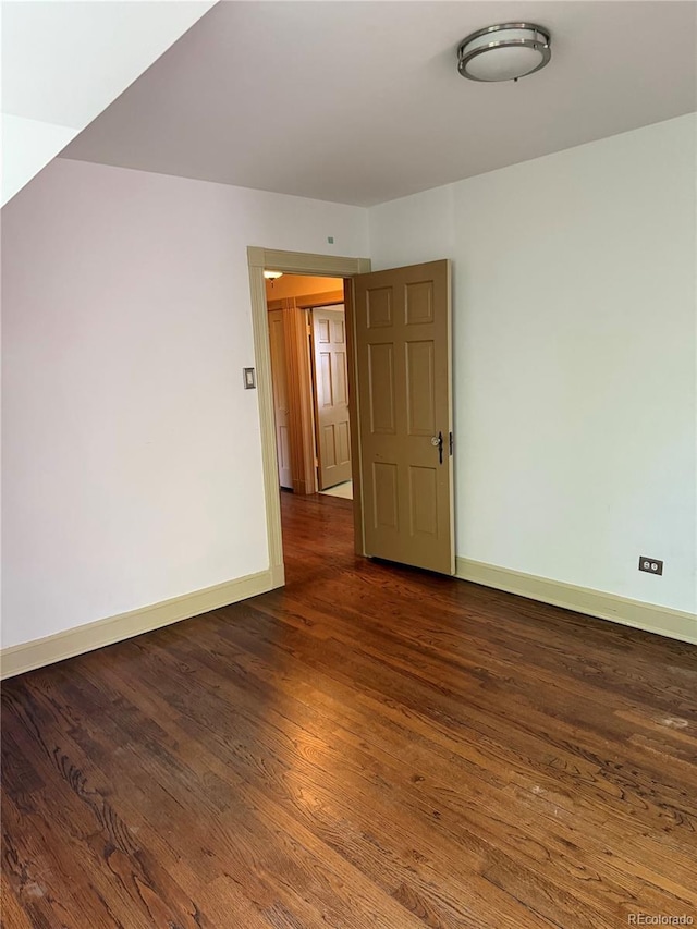 6375 E 6th Avenue Parkway, Denver, CO 80220 - unfurnished room with baseboards and wood finished floors