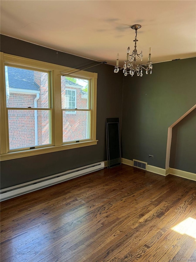 6375 E 6th Avenue Parkway, Denver, CO 80220 - unfurnished dining area featuring a baseboard radiator, a chandelier, and dark wood-type flooring