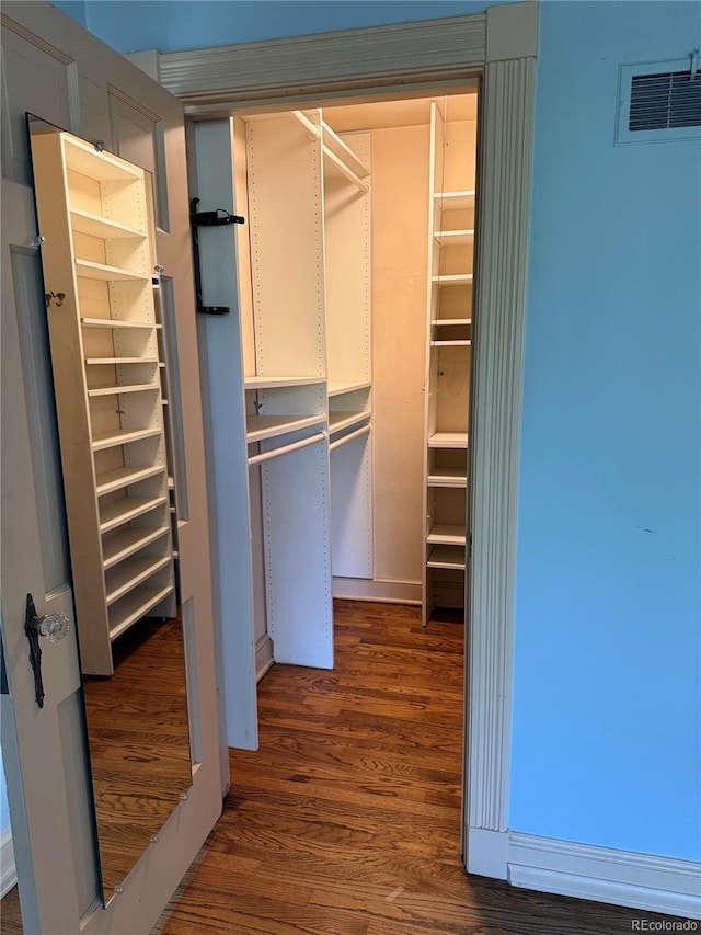 6375 E 6th Avenue Parkway, Denver, CO 80220 - spacious closet featuring wood finished floors