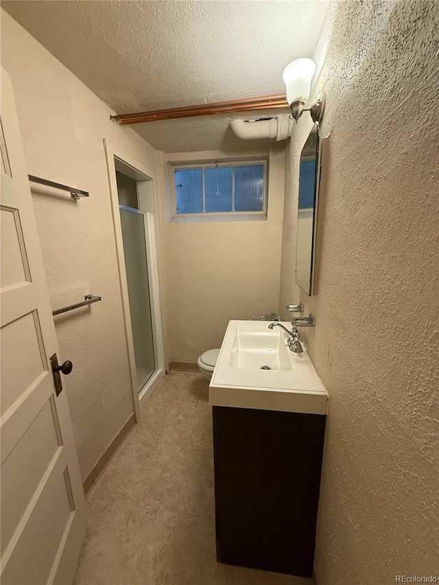 6375 E 6th Avenue Parkway, Denver, CO 80220 - full bathroom with vanity, a shower stall, and a textured ceiling