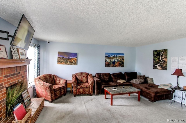 carpeted living room featuring a textured ceiling and a fireplace