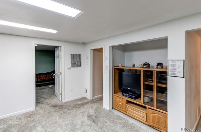 living room featuring light colored carpet