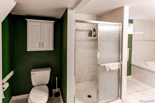 bathroom with plus walk in shower, tile floors, and toilet