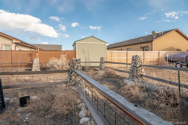 view of yard featuring a storage unit