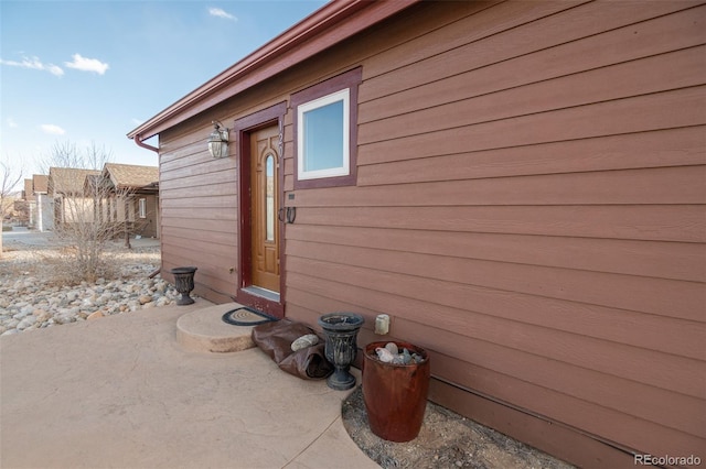 view of property exterior featuring a patio