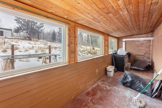 sunroom / solarium featuring wooden ceiling