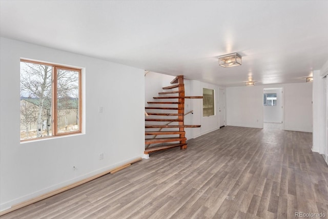 unfurnished living room featuring light wood-type flooring