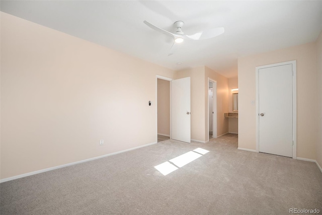 unfurnished bedroom with light carpet and ceiling fan