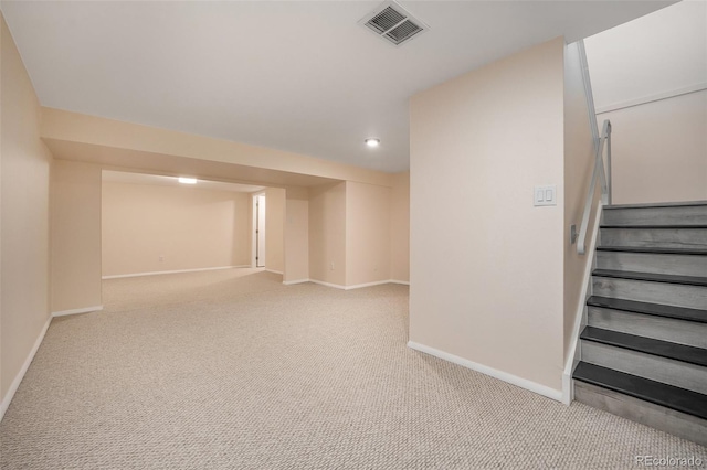 basement with light colored carpet