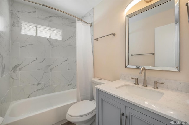 full bathroom with vanity, shower / bath combination with curtain, and toilet