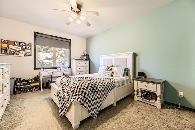 bedroom with light carpet and ceiling fan