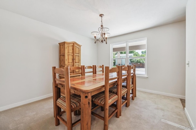 8445 Lamar Dr, Arvada, CO 80003 - dining area with a chandelier and light colored carpet