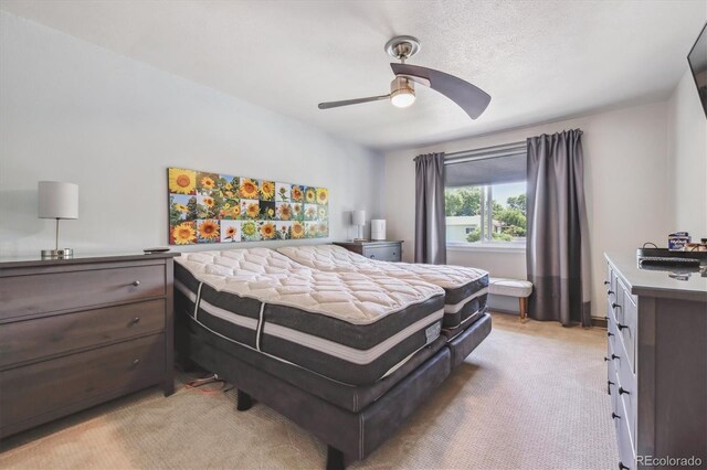 8445 Lamar Dr, Arvada, CO 80003 - bedroom featuring light colored carpet and ceiling fan