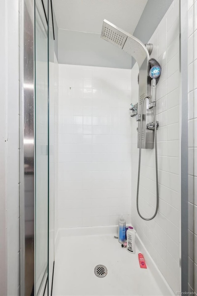 8445 Lamar Dr, Arvada, CO 80003 - bathroom with a shower stall