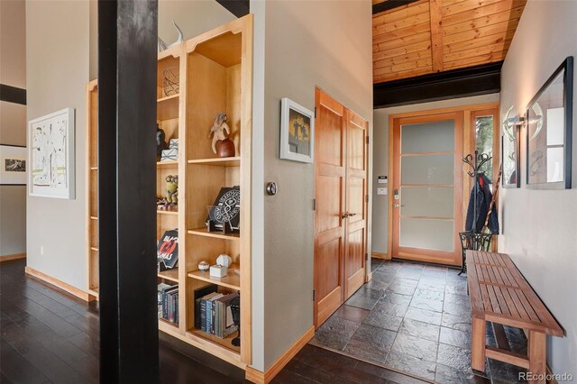 116 Ramona Rd, Golden, CO 80403 - hall featuring baseboards, wood ceiling, dark wood-type flooring, and vaulted ceiling