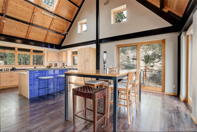 116 Ramona Rd, Golden, CO 80403 - dining room with wooden ceiling, high vaulted ceiling, beam ceiling, dark wood-style floors, and baseboards