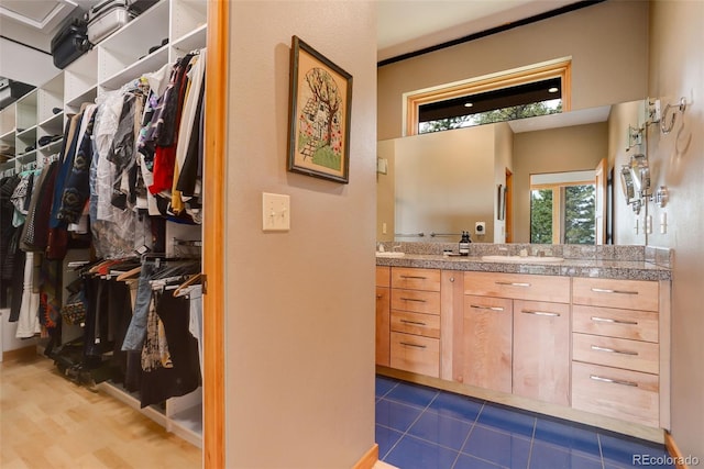 116 Ramona Rd, Golden, CO 80403 - full bathroom featuring vanity and a walk in closet