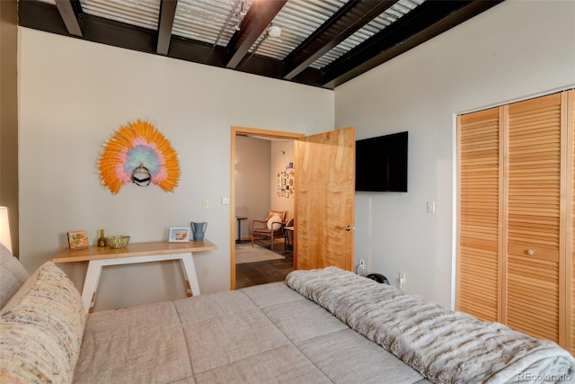 116 Ramona Rd, Golden, CO 80403 - bedroom with a closet and beamed ceiling