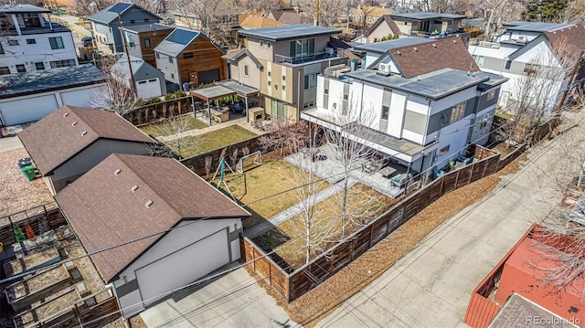 birds eye view of property with a residential view